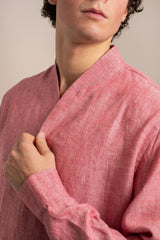 Close View Of Man Wearing Pink Collarless Linen Shirt With Shawl Collar